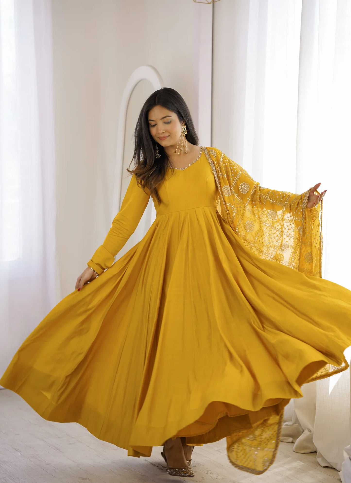 Yellow Heavy Roman Silk Anarkali Suit